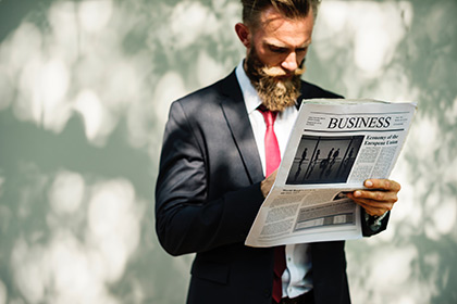 Gentlemen reading newspaper